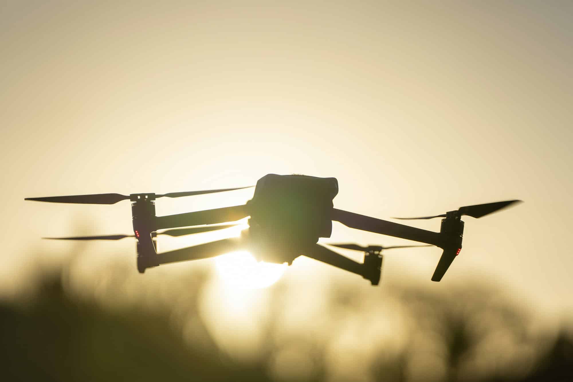 Ferkomedia - Drone quadcopter with digital camera and fast rotating propellers flying taking video and pictures