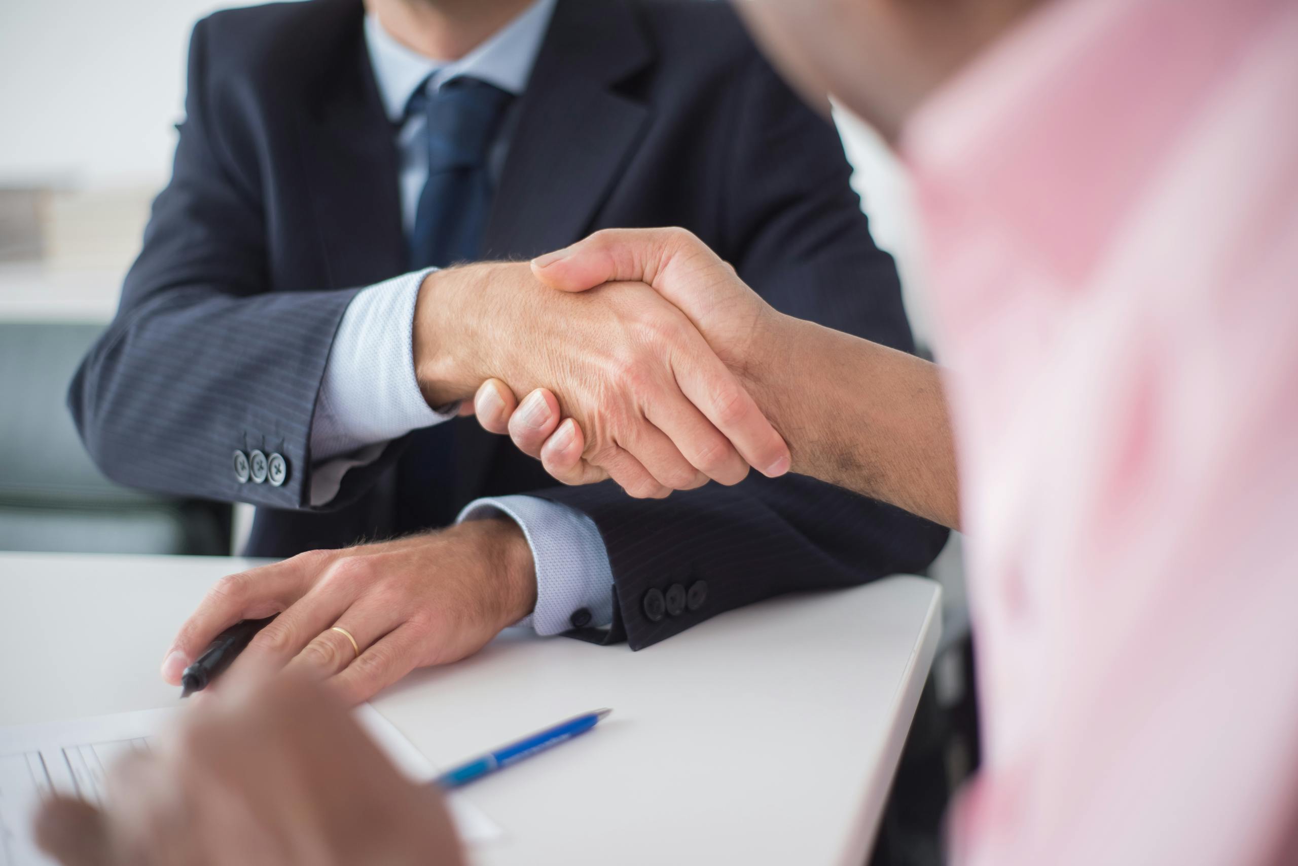 Two businessmen shaking hands